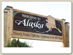 Welcome sign on the Alaska Highway